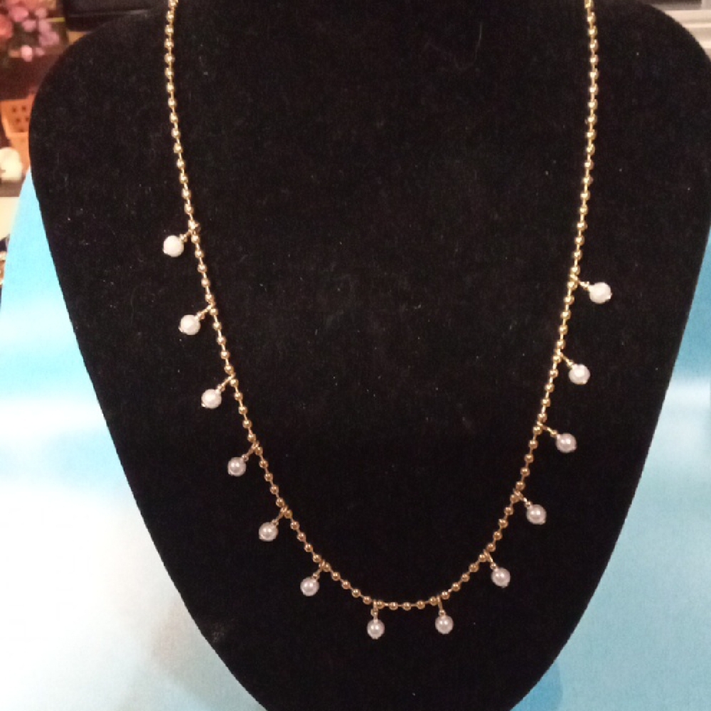 Elegant Gold and White Beaded Necklace